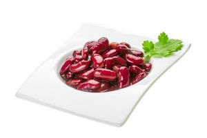 Marinated bean in a bowl on white background photo
