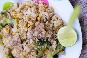 Fried rice is an easy and delicious dish. consisting of eggs Pork and broccoli and still affordable during bad economic times. photo