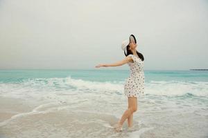 Happy Beautiful Woman Enjoying Summer Vacation photo