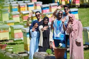 people group visiting local honey production farm photo