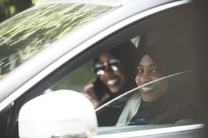 Arabic Woman Couple Traveling By Car photo