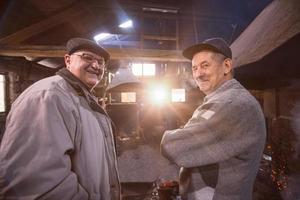 portrait of two confident senior blacksmith photo