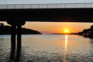 sunset on river photo