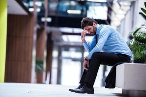 frustrated young business man photo