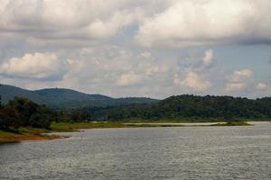 river, mountains and sky It is a beautiful and peaceful nature. Suitable for leisure and camping. photo