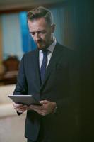 business man using tablet computer photo