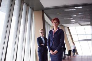 business woman goup at modern bright office photo