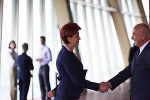 handshake of business woman and man photo