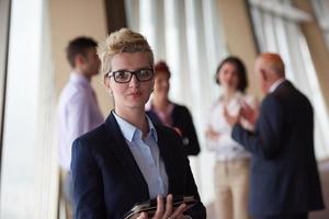 diverse business people group with blonde  woman in front photo