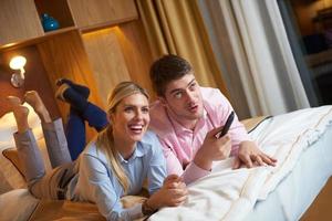 young couple in modern hotel room photo