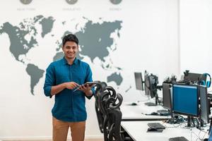 Portrait of casual business men leader standing confidence at Co-Working space.Small Business Startup Concept. Selective focus photo