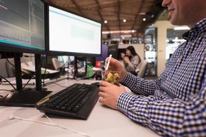 software developer eating a fruit salad photo