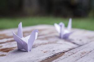 The origami bird is believed to be a sacred bird and a symbol of longevity, hope, good luck and peace. photo
