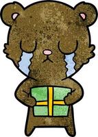 crying cartoon bear with present vector