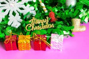 Background of Christmas decorative object selective focus on Merry Christmas text. photo