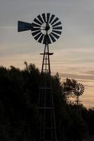 farm old windmill  for water photo