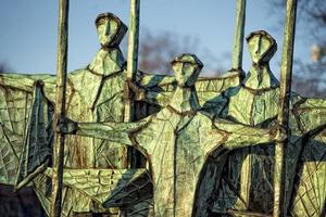 fisherman sailor silhouette copper statue in hamburg photo