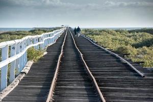 Geraldton antique wood railway jetty in West Australia photo