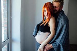 Pregnant couple portriat photo