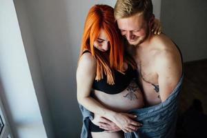 Pregnant couple portrait photo