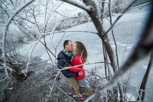 Couple in winter landscape photo