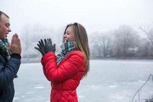 Couple in winter landscape photo