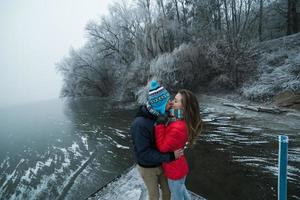 Couple in winter landscape photo