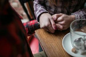 View of couples hands photo