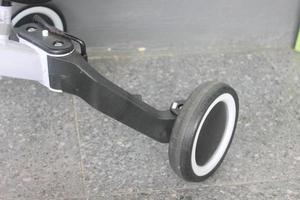 Close-up of children's tricycle wheel photo