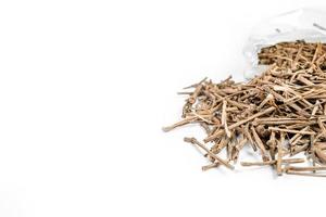 Organic dry barks of Indian Jalap or Nishodh or Operculina turpethum isolated on white background photo