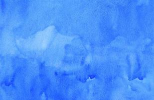 Watercolor deep blue background texture hand painted. Aquarelle sky blue abstract backdrop. photo