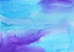 Watercolor light blue and purple background painting texture. Multicolored watery soft backdrop. Stains on paper. photo