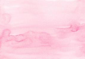 Watercolor pastel soft pink background painting. Watercolour light fuchsia liquid backdrop. Stains on paper. photo