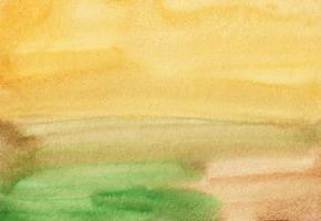 Watercolor light yellow, green, brown background painting texture. Abstract landscape art. Multicolored watercolour backdrop, stains on paper. photo
