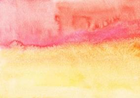 Watercolor light yellow, orange and pink background. Multicolored watercolour bright soft backdrop, stains on paper. photo