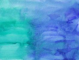 Watercolor blue and turquoise background painting texture. Multicolored watercolour liquid backdrop. Stains on paper. photo