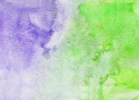 Watercolor light green and violet background painting texture. Multicolored watercolour pastel backdrop. Stains on paper. photo