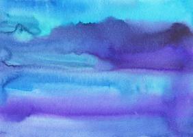 Watercolor blue and violet background painting texture. Colorful watercolour brush strokes backdrop. Stains on paper. photo