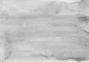 Watercolor light gray background painting texture. Monochrome stains on paper backdrop overlay. Modern abstract black and white aquarelle art. photo
