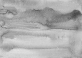 textura de fondo gris calma acuarela. manchas monocromáticas en la superposición de fondo de papel. pintura abstracta de acuarela en blanco y negro. foto