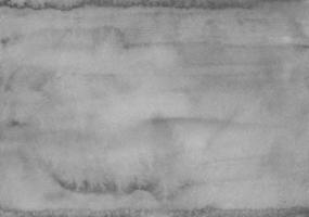 textura de fondo gris calma acuarela. acuarela viejo telón de fondo monocromático. manchas en papel. foto