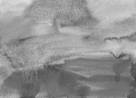 acuarela fondo líquido gris y blanco. textura de salpicaduras de acuarela gris. telón de fondo monocromático acuoso. foto