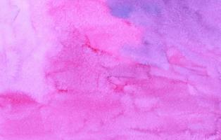 Watercolor deep fuchsia and purple background painting. Liquid pink backdrop. Stains on paper. photo