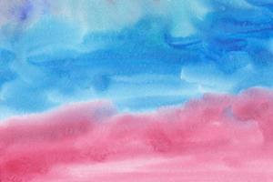 Watercolor calm pink and blue background painting. Stains on paper, artistic beautiful backdrop. Hand painted texture photo