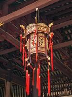 Chinese Red lantern on the ceiling in the Chinese Temple photo