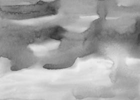 acuarela sucia fondo líquido gris y negro. manchas monocromáticas sobre papel. telón de fondo blanco y negro abstracto. foto