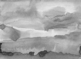 Watercolor calm gray liquid background texture. Monochrome stains on paper. Abstract black and white aquarelle painting. photo