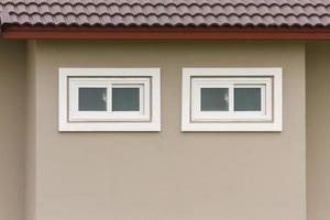 Modern window frame outside the house photo