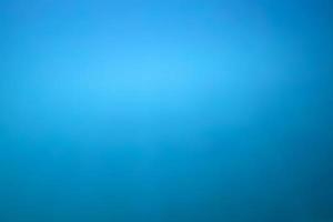 Blue color underwater ocean abstract blur for background photo