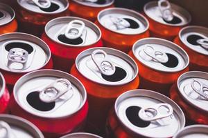 Empty aluminium drink cans recycling background concept photo